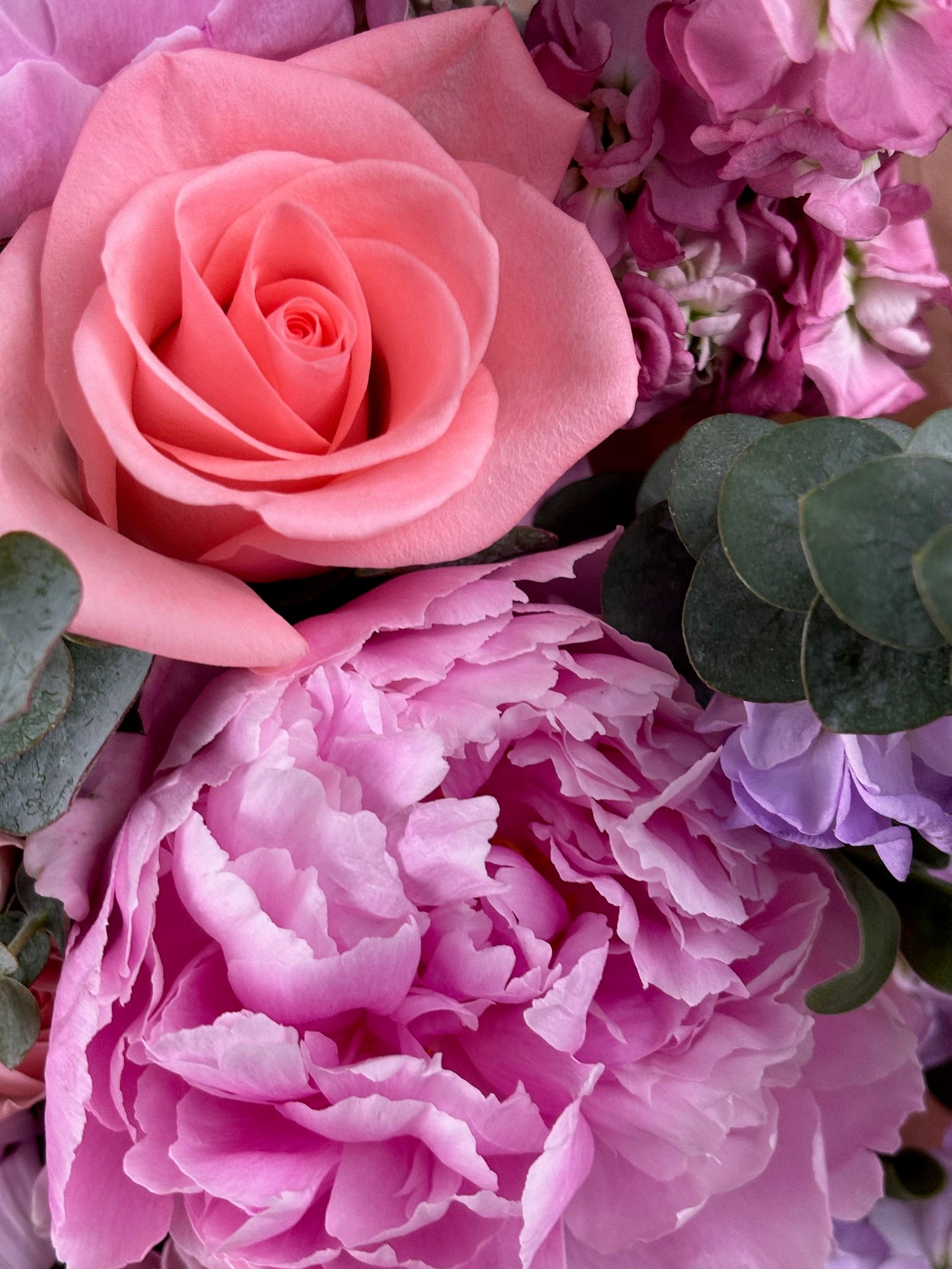 Close up of flower arrangement by Jolie Flower Shop