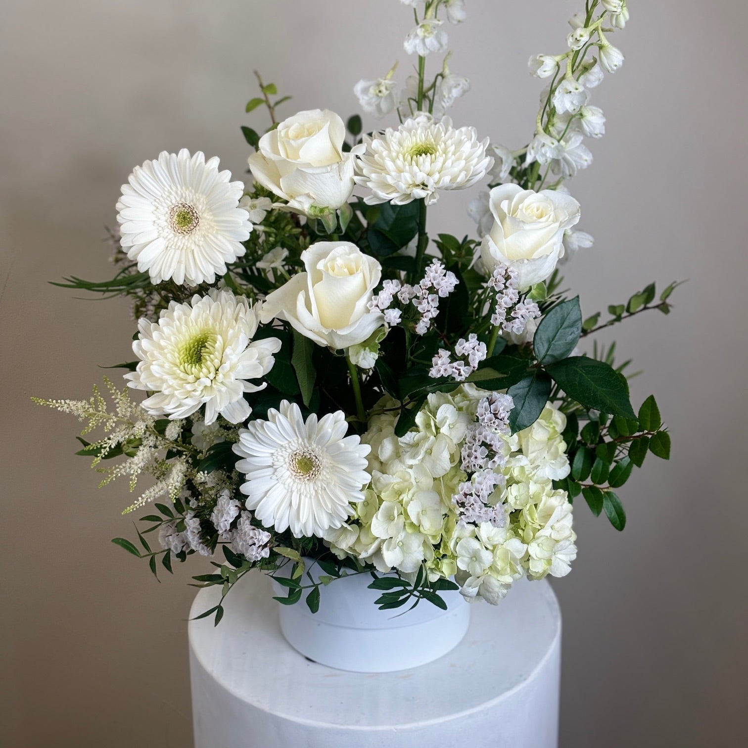 White arrangement on a neutral background