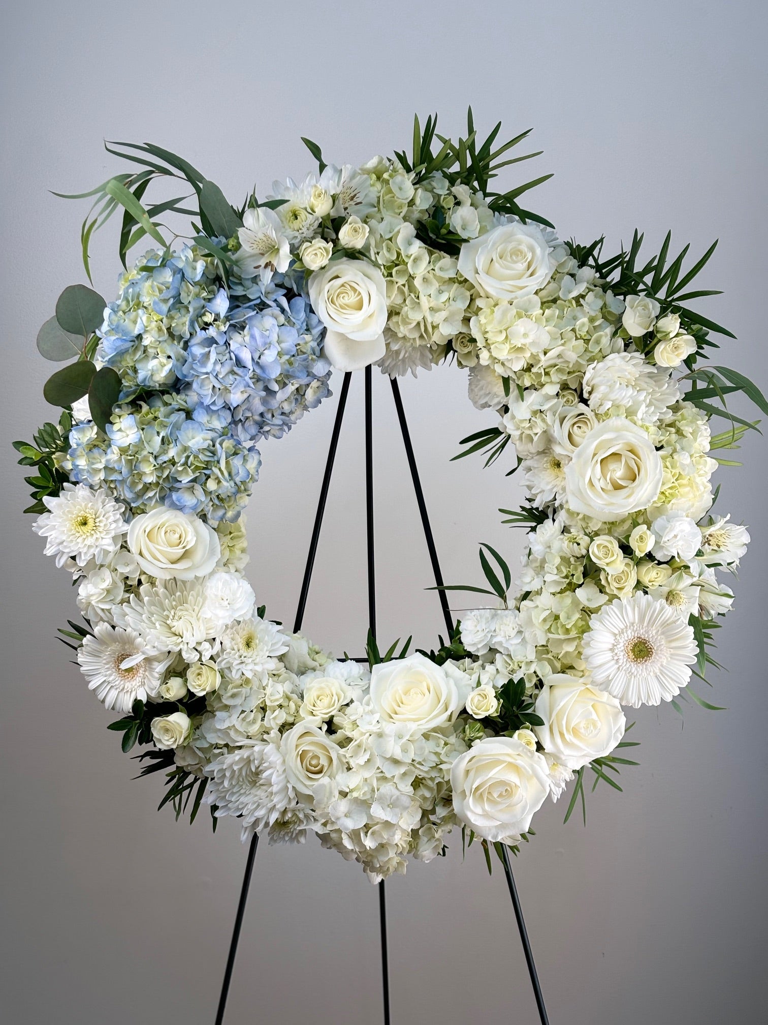 White Sympathy Flower Wreath by Jolie Flower Shop of Cape Cod